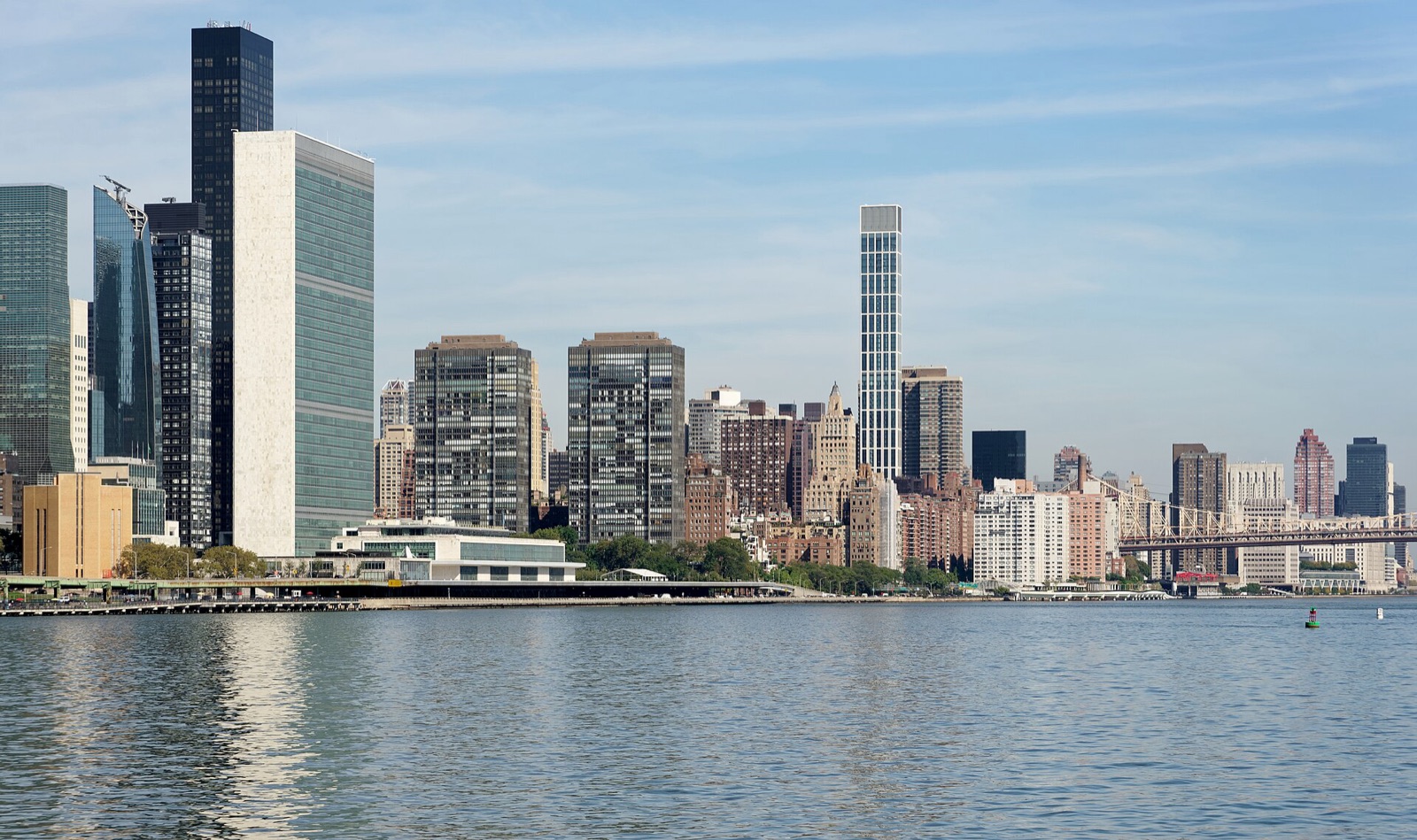 The United Nations Headquarters building on the shore of the East River in New York